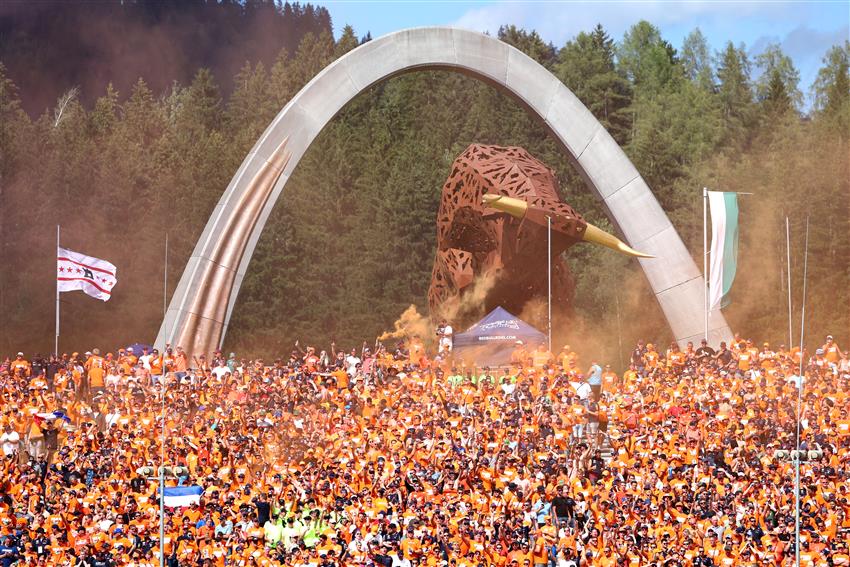 Austrian f1 track with orange smoke